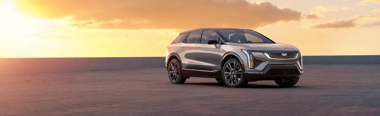 2025 Cadillac Optiq in white at sunset